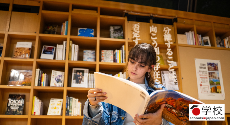 Woman reading book in university library